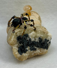 Load image into Gallery viewer, Calcite Display with Black Lava Spiderling