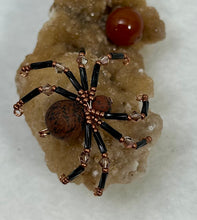 Load image into Gallery viewer, Calcite Display with Mahogany Obsidian Spiderling