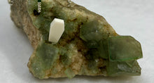 Load image into Gallery viewer, Green Fluorite Display with Ruby in Zoisite Spiderling