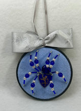 Load image into Gallery viewer, Vintage Metal Lion Shield Cufflink on Blue 4 Inch Hoop Spider
