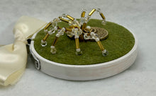 Load image into Gallery viewer, Vintage Cufflink Gold Shell with Pearl on Olive 3 Inch Hoop Spider