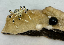 Load image into Gallery viewer, Calcite Display with Dalmatian Jasper Spiderling

