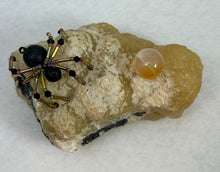 Load image into Gallery viewer, Calcite Display with Black Lava Spiderling
