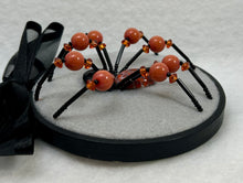 Load image into Gallery viewer, Vintage Orange &amp; White Cabachon Cufflink on Grey 4 Inch Hoop Spider
