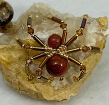 Load image into Gallery viewer, Quartz Geode with Brown Goldstone Spiderling
